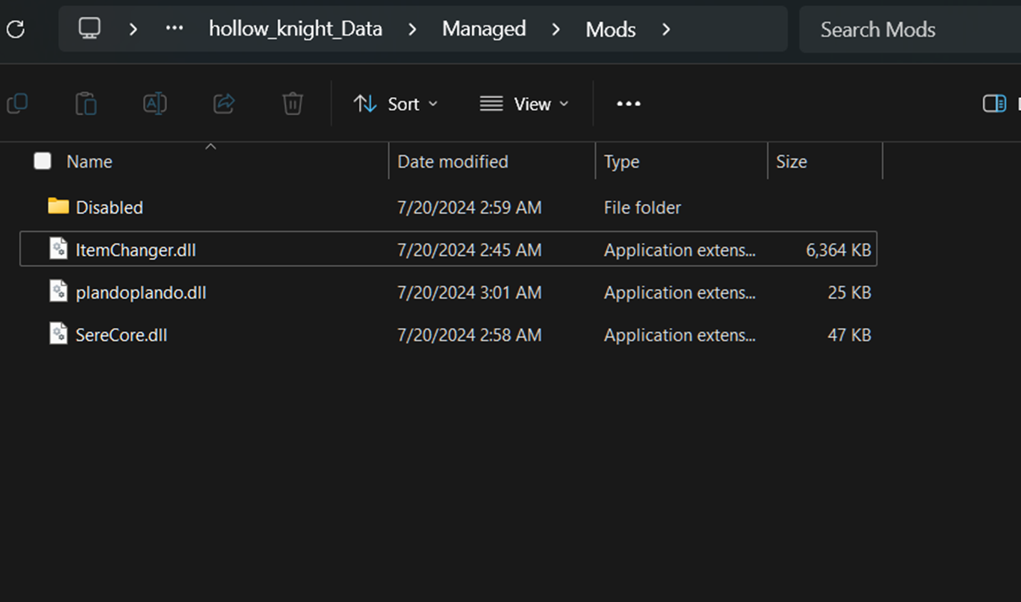 A screenshot of the contents of the mods folder. There is a single subfolder named 'Disabled'. Below it, the user has pasted the 3 mod DLLs directly into the folder.